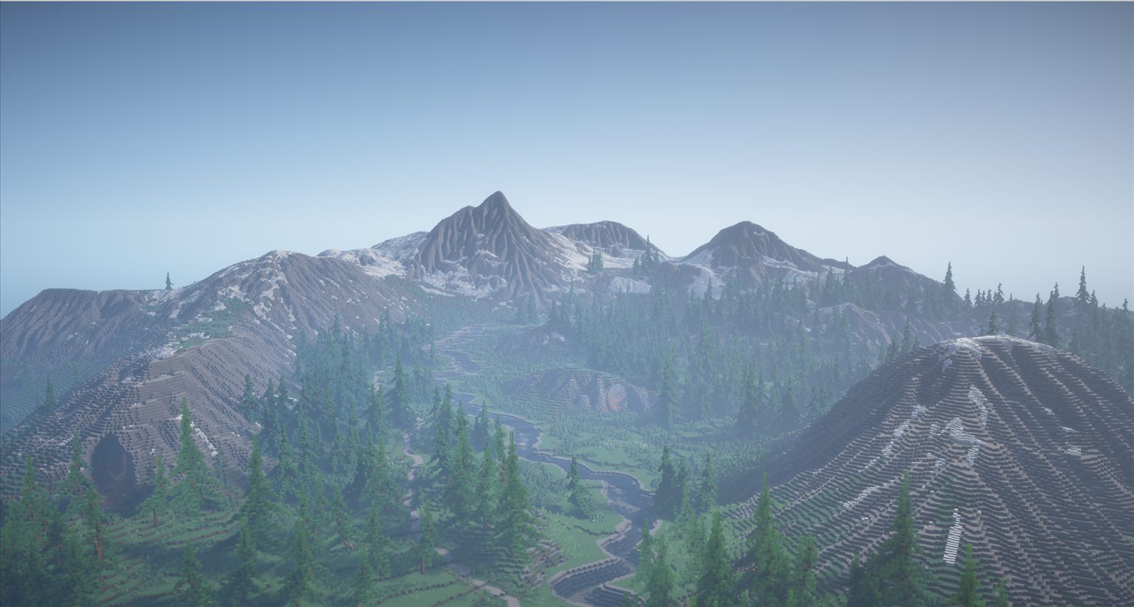 The finished valley exported and rendered inside Minecraft: pine forests, the river, and snow-capped peaks.
